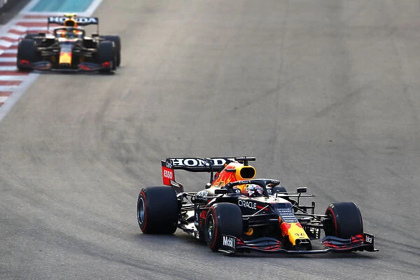 Action. Max Verstappen, Red Bull Racing RB16B, leads Sergio Perez, Red Bull Racing RB16B
