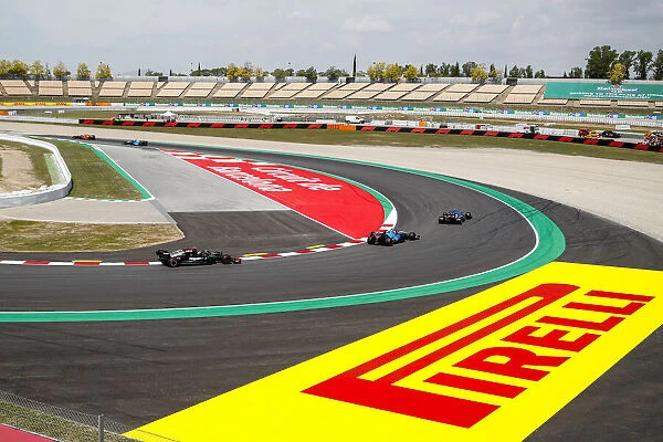 Action Pirelli. Esteban Ocon, Alpine A521, leads Nicholas Latifi, Williams FW43B,