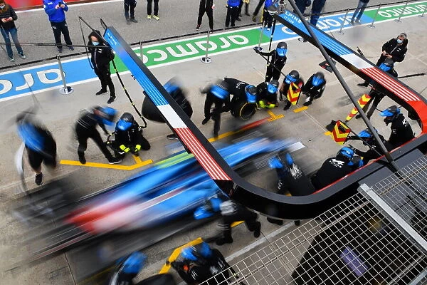 atmosphere. The Alpine F1 practice a pitstop